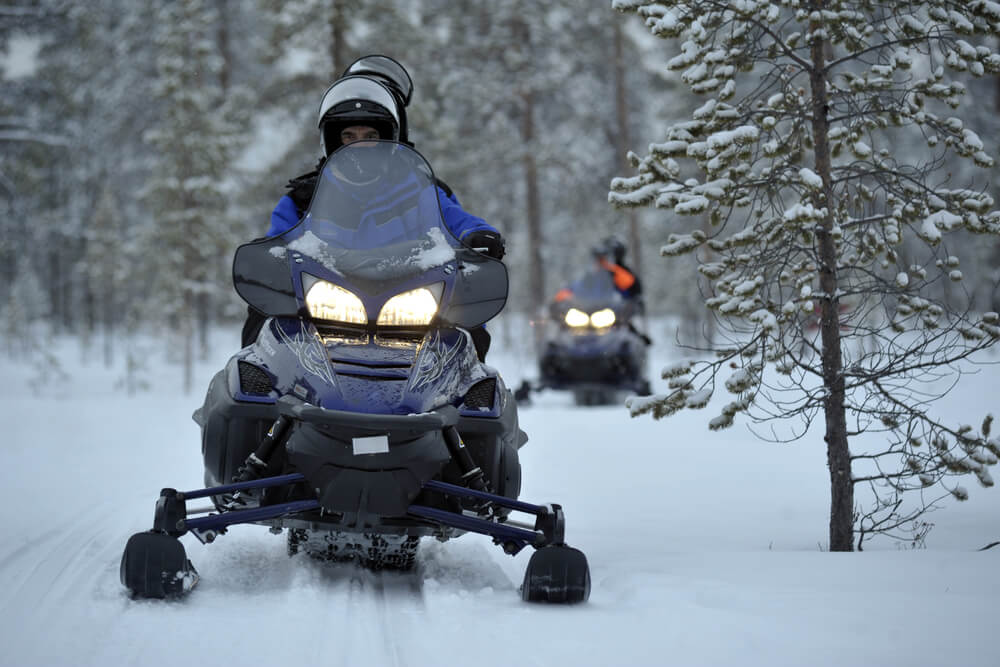 Photo of a person enjoying the Wisconsin Dells snowmobiling near Sand County Vacation Rentals