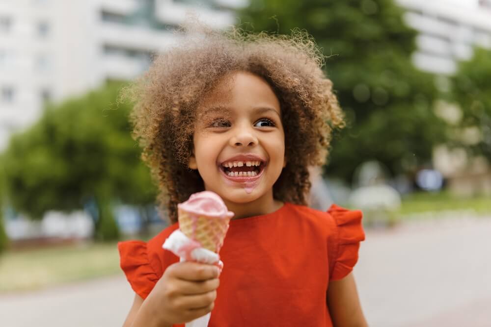 Photo of a child holding ice cream in Wisconsin Dells